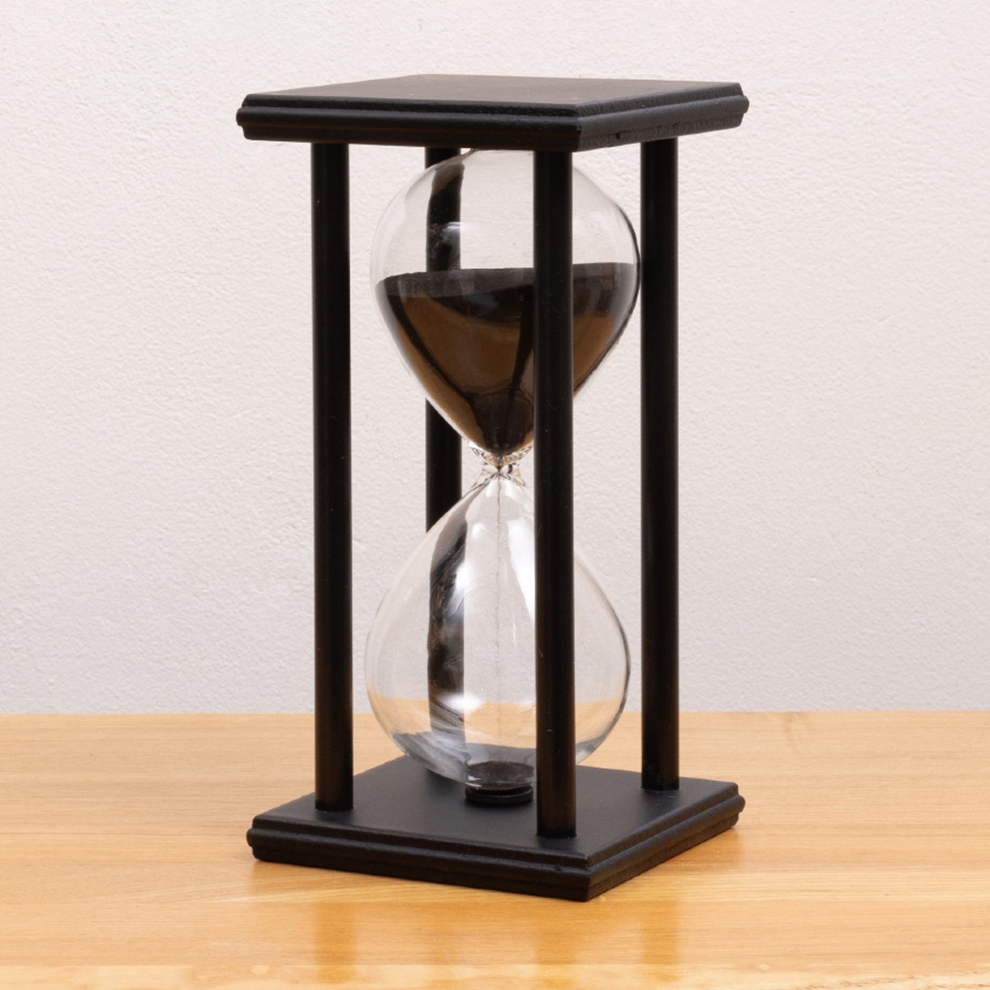 elegant black wood frame sand timer 